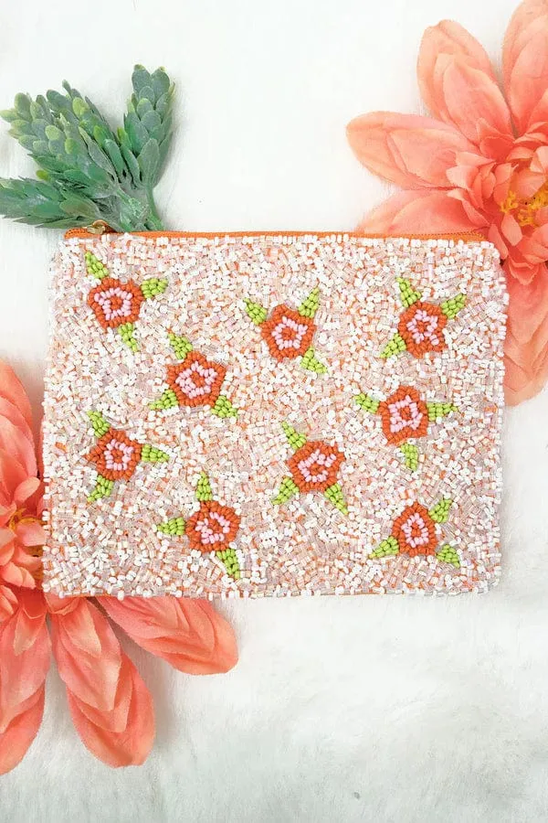 Large coral beaded coin clutch